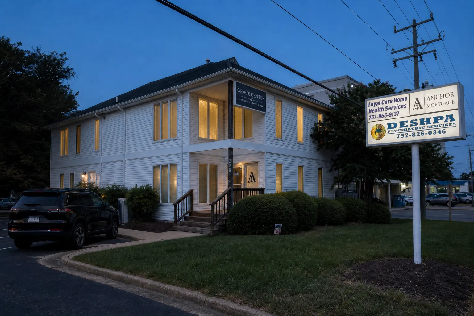 Grace Center office exterior at blue hour with Anchor Mortgage window mark