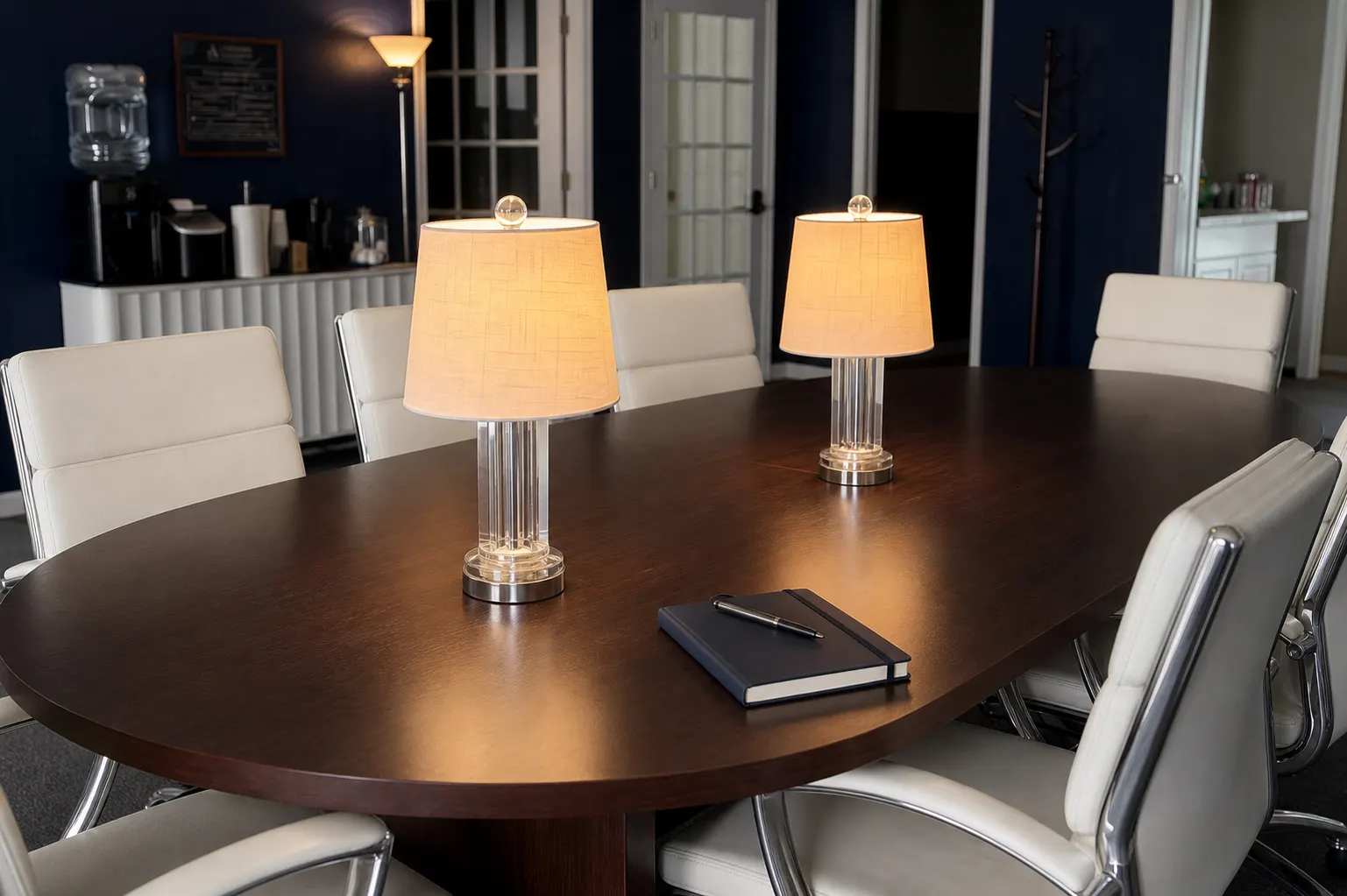 Warm lamps and materials on the Anchor conference table